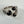 Load image into Gallery viewer, BLACK ONYX AND WHITE TOPAZ WRAPAROUND RING ADJUSTABLE (MW 238)
