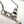 Load image into Gallery viewer, WHITE BUFFALO TURQUOISE NATIVE HANDMADE "V" DANGLE NECKLACE (UP TO 21") BY RUSSELL SAM (NP 10)

