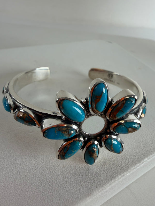 SPINY TURQUOISE ADJUSTABLE FLOWER CUFF BY HESPERA (JR 64)