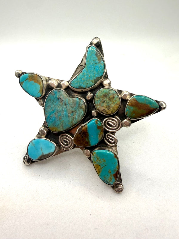 JACQUELINE SILVER  MINE 8 TURQUOISE CLUSTER STAR ADJ RING (LA 17)