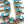 Load image into Gallery viewer, (RARE PIECE) EFFIE CALAVAZA ZUNI SLEEPING BEAUTY TURQUOISE SNAKE SQUASH BLOSSOM NECKLACE 22" &amp; POST BACK EARRINGS NAVAJO HANDMADE SET (NP 33)
