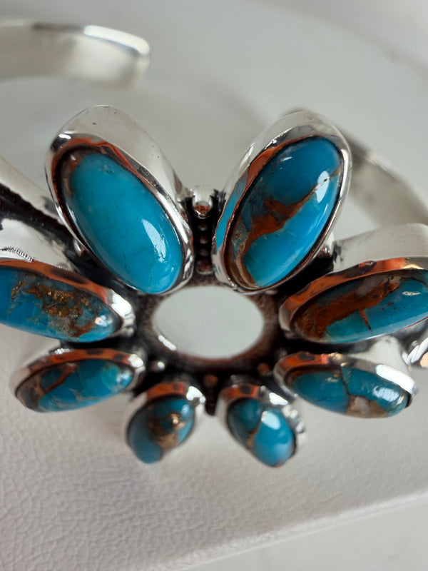 SPINY TURQUOISE ADJUSTABLE FLOWER CUFF BY HESPERA (JR 64)