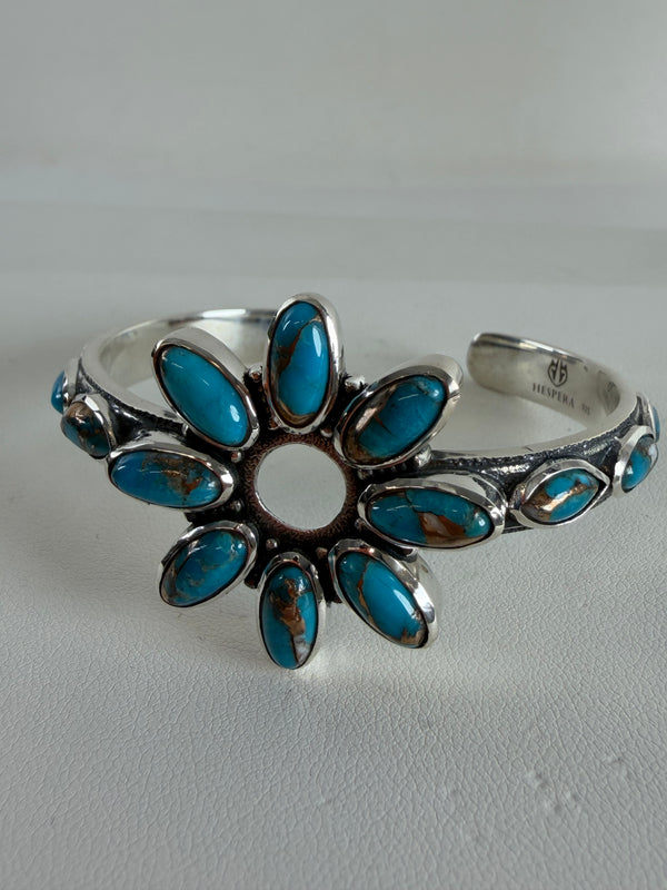 SPINY TURQUOISE ADJUSTABLE FLOWER CUFF BY HESPERA (JR 64)